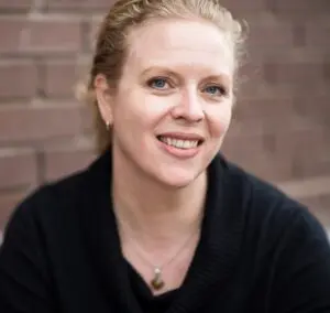 Professional headshot of Kristin Paulson, President and CEO of CIVHC, smiling and dressed in professional attire against a neutral background. The image is used in official communications related to her leadership role.